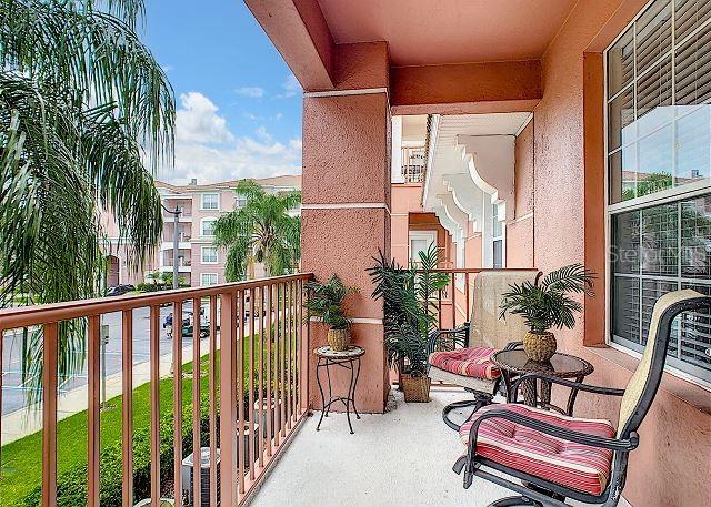 4862 Cayview Avenue, Unit 20909 Orlando, FL 32819 - Photo 28 of 38 a view of balcony with furniture