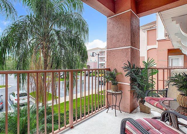 4862 Cayview Avenue, Unit 20909 Orlando, FL 32819 - Photo 29 of 38 a view of balcony with furniture