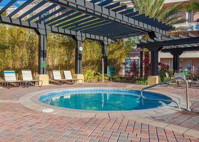 4862 Cayview Avenue, Unit 20909 Orlando, FL 32819 - Photo 32 of 38 a view of outdoor space yard swimming pool and patio