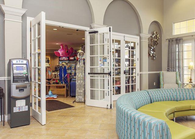 4862 Cayview Avenue, Unit 20909 Orlando, FL 32819 - Photo 35 of 38 a living room with furniture and a fireplace