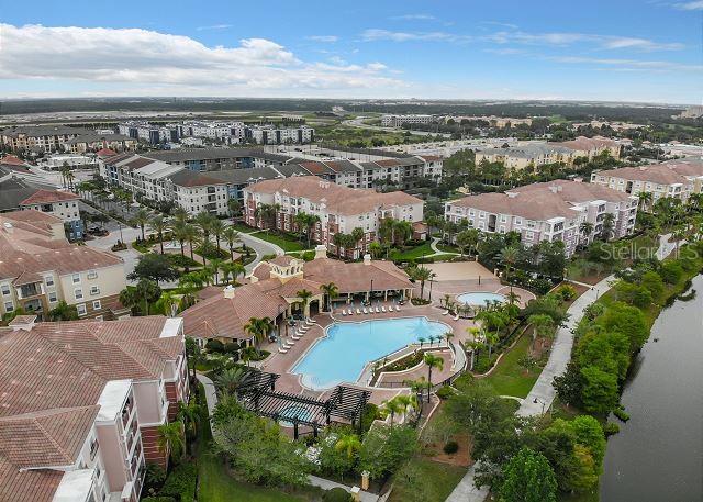 4862 Cayview Avenue, Unit 20909 Orlando, FL 32819 - Photo 5 of 38 an aerial view of a city