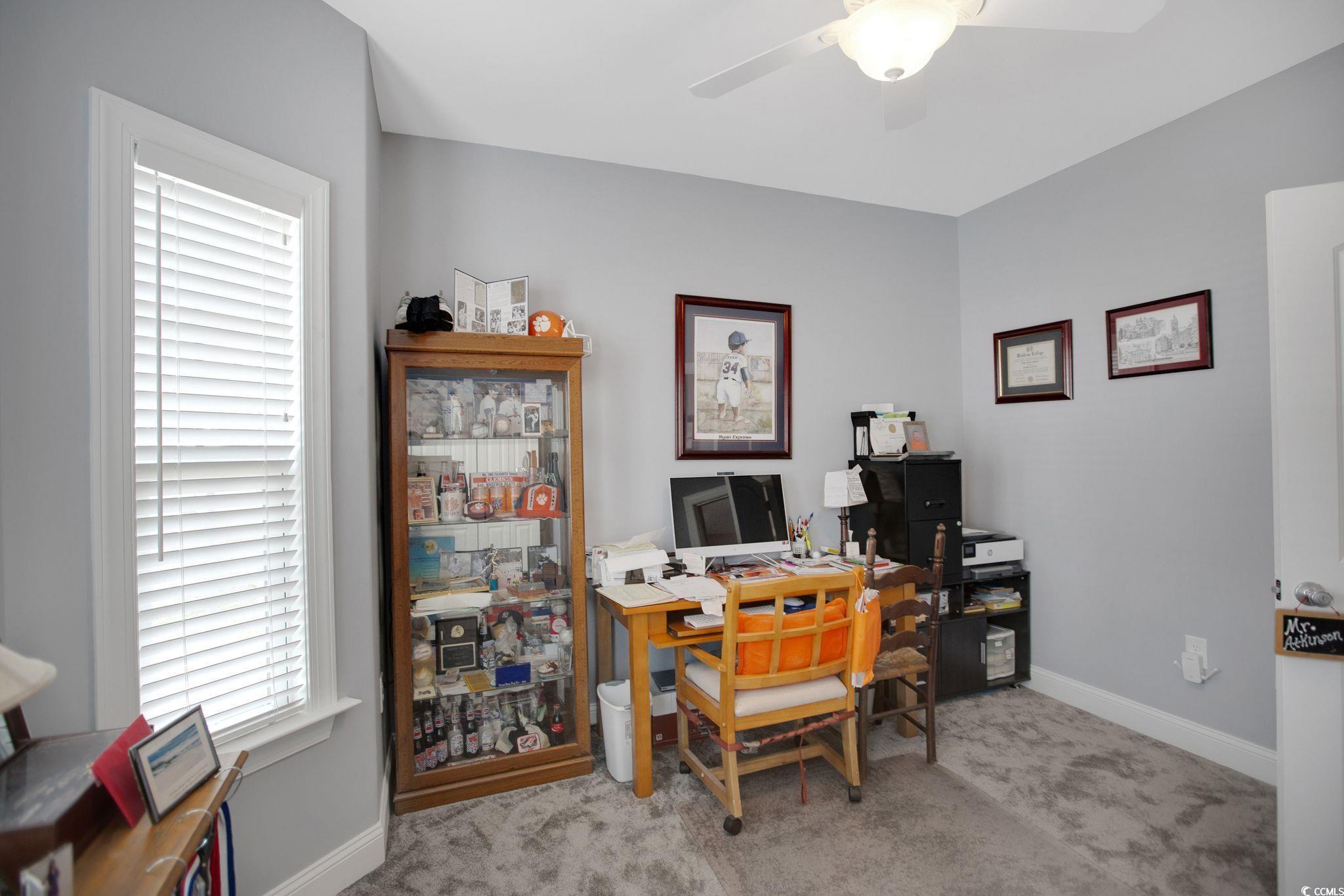607 Garden Avenue Georgetown, SC 29440 - Photo 14 of 35 Home office with light colored carpet and ceiling fan