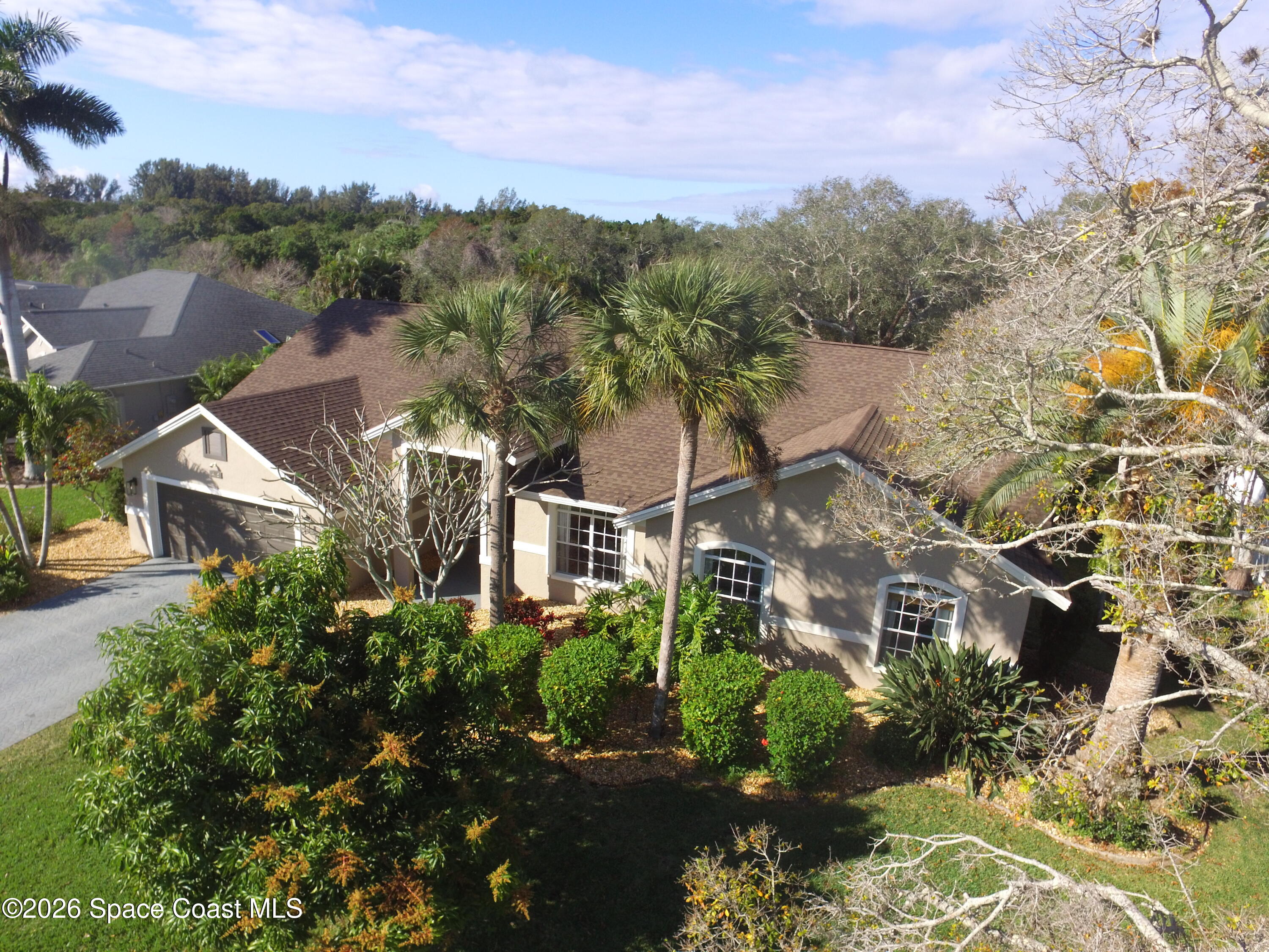 4115 Savannahs Trail Merritt Island, FL 32953 - Photo 38 of 42 a view of a city with a building in the background
