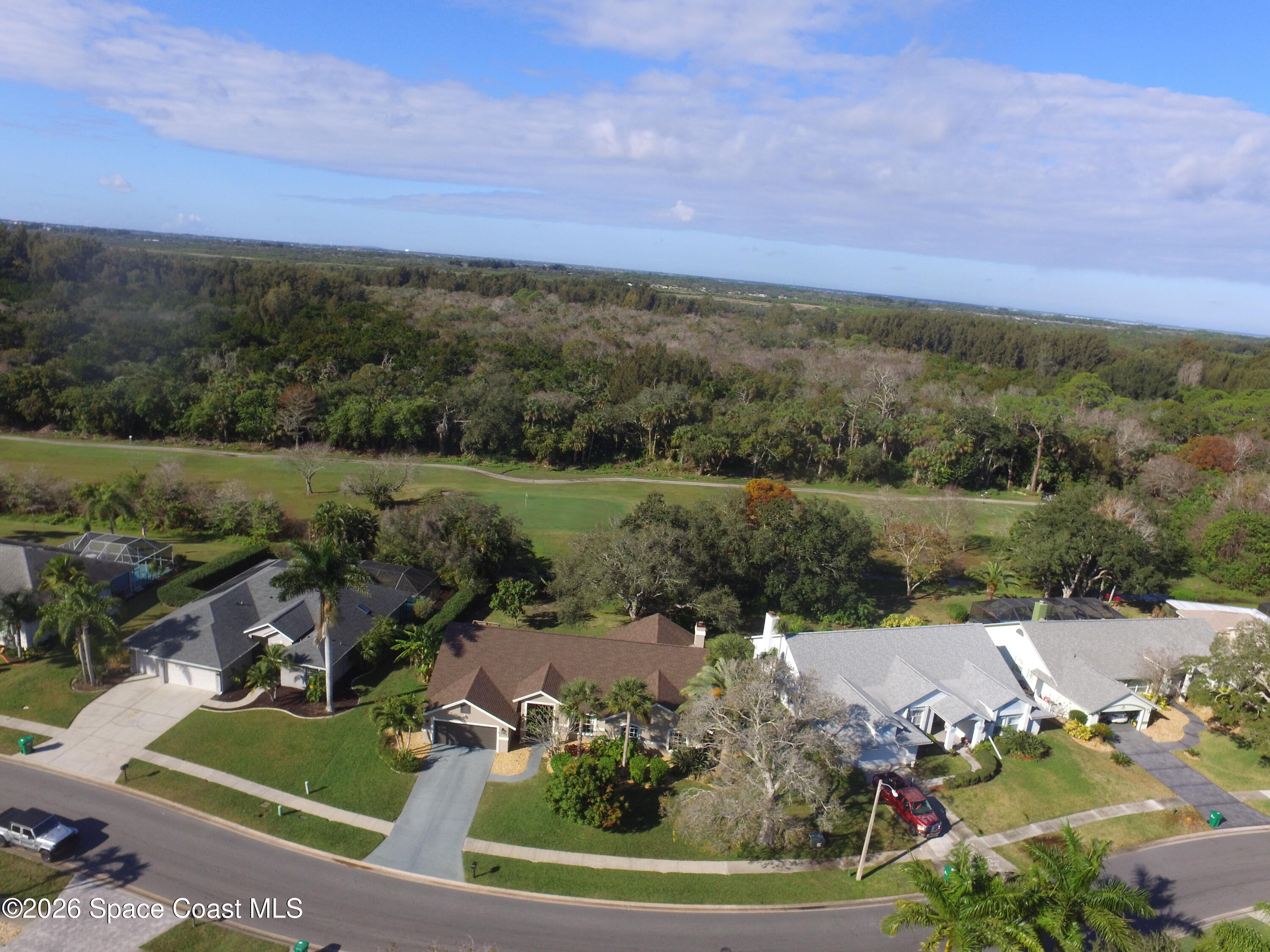 4115 Savannahs Trail Merritt Island, FL 32953 - Photo 39 of 42 a view of a lake with a yard