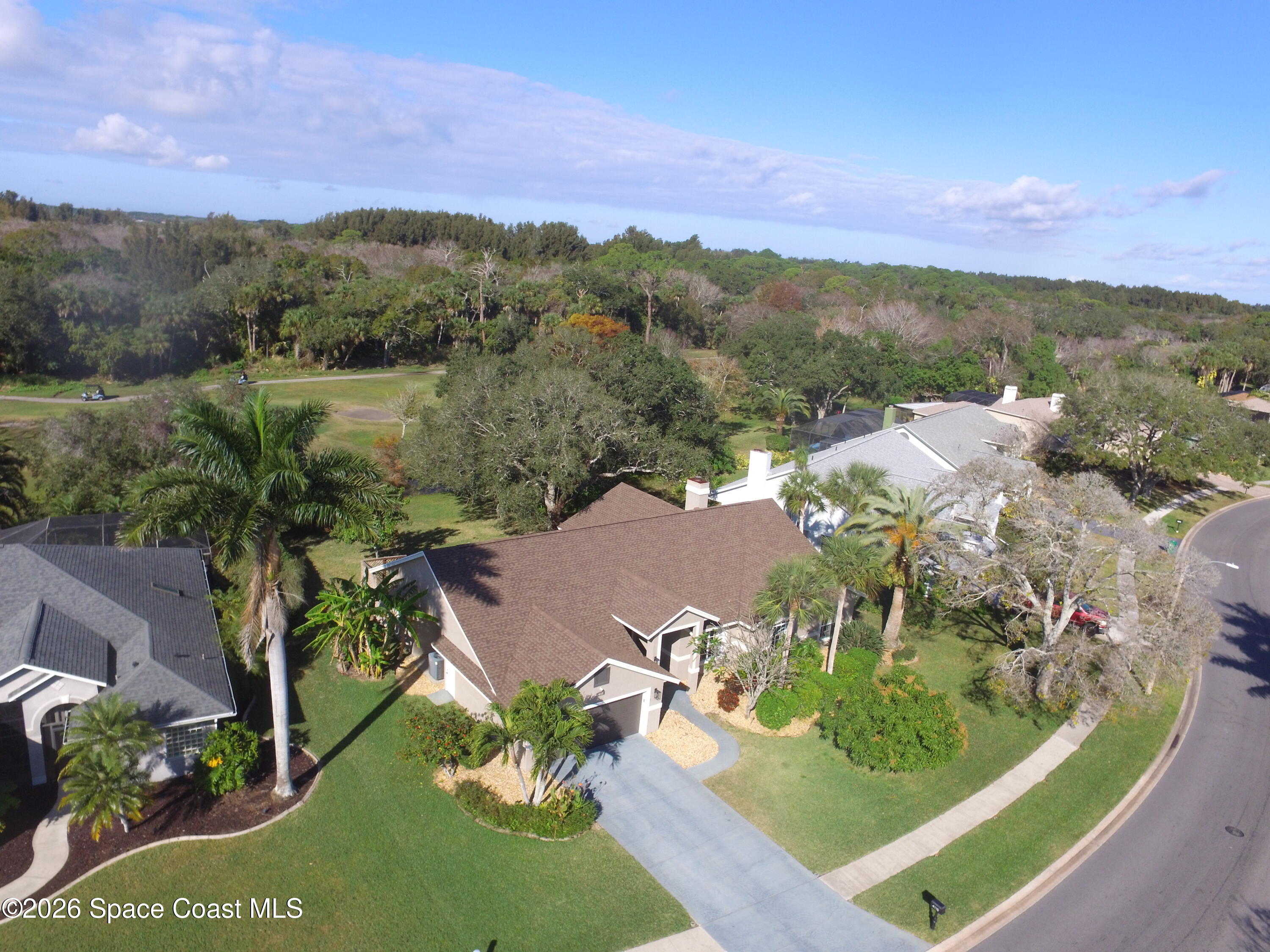 4115 Savannahs Trail Merritt Island, FL 32953 - Photo 40 of 42 a view of a lake in middle of the town