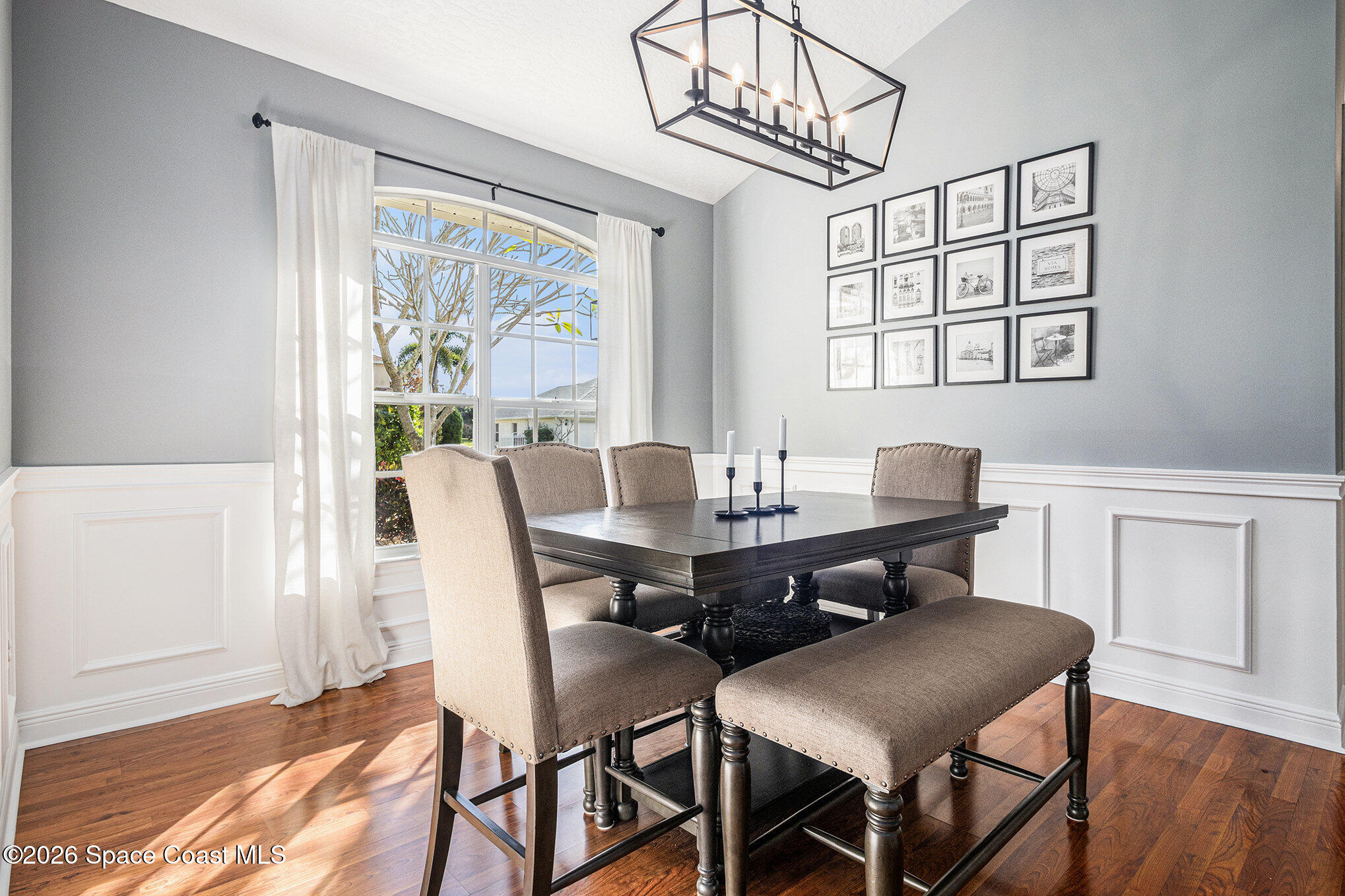 4115 Savannahs Trail Merritt Island, FL 32953 - Photo 8 of 42 a view of a dining room with furniture window and wooden floor