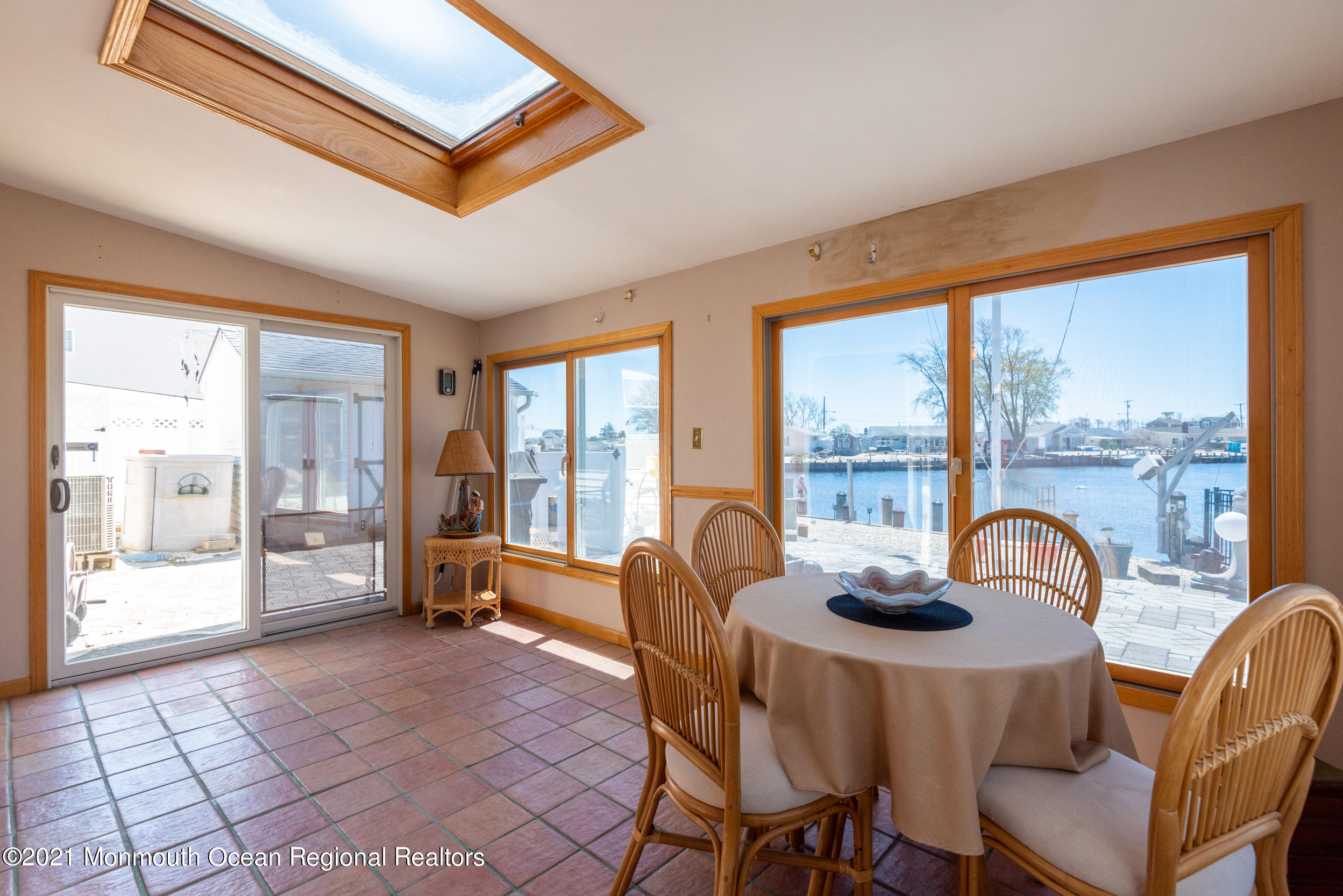 204 Maplewood Road Barnegat, NJ 08005 - Photo 12 of 26 a dining room with furniture and large windows