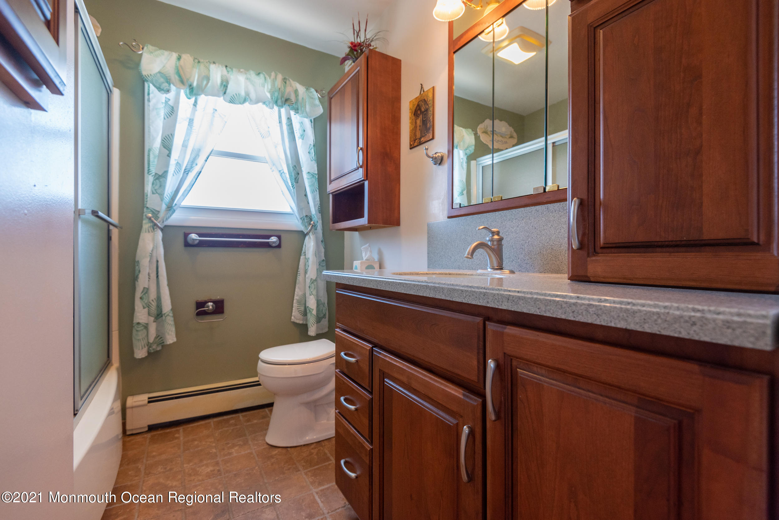 204 Maplewood Road Barnegat, NJ 08005 - Photo 19 of 26 a bathroom with a granite countertop toilet sink and mirror