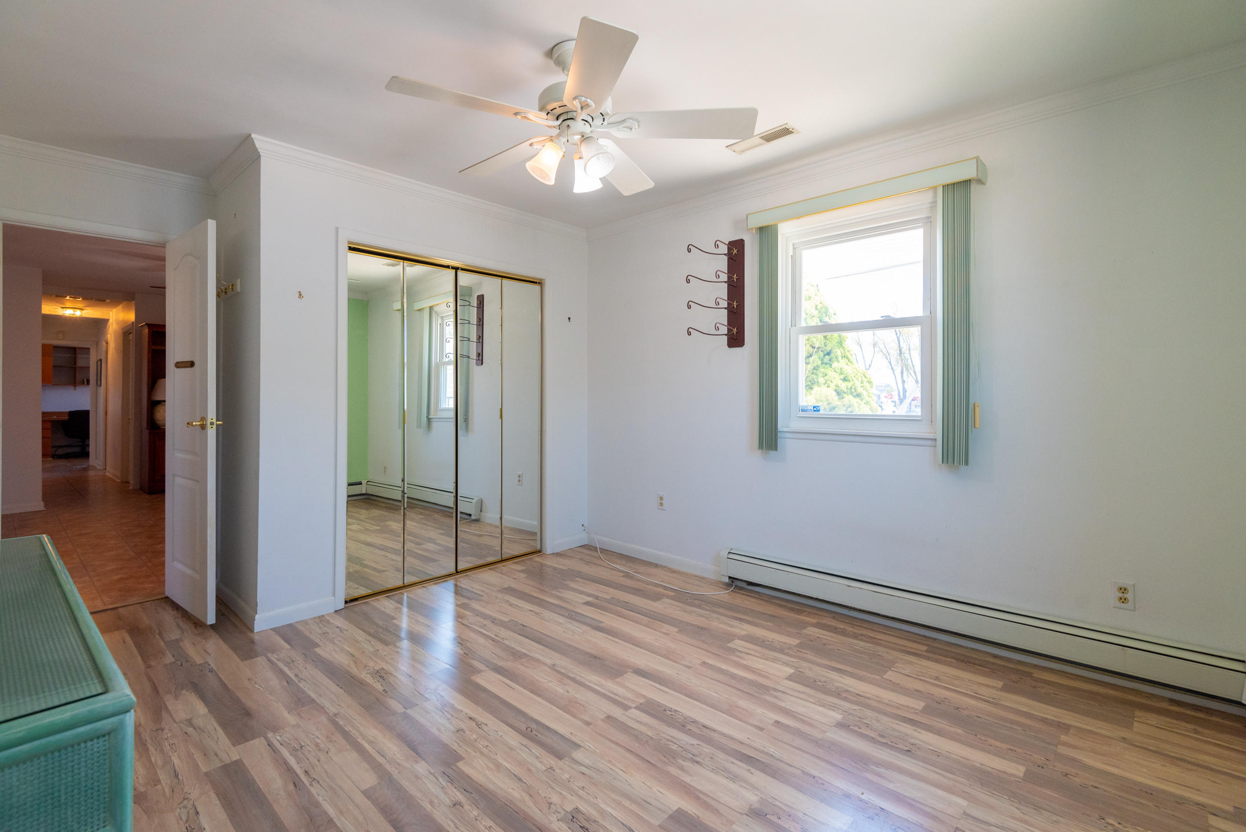204 Maplewood Road Barnegat, NJ 08005 - Photo 22 of 26 wooden floor in an empty room with a window
