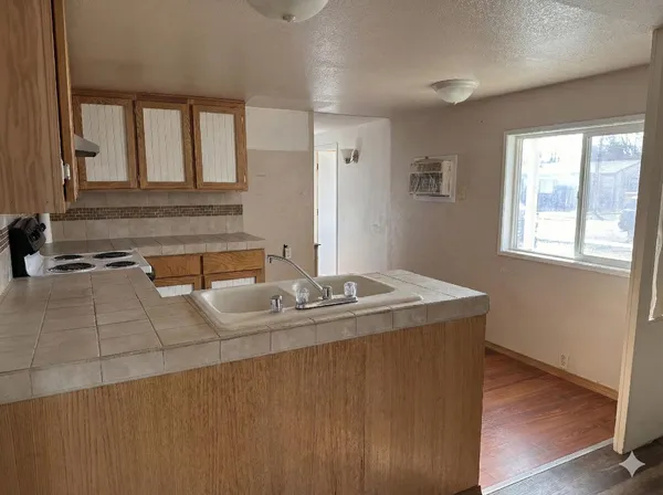 a bathroom with a shower and a toilet