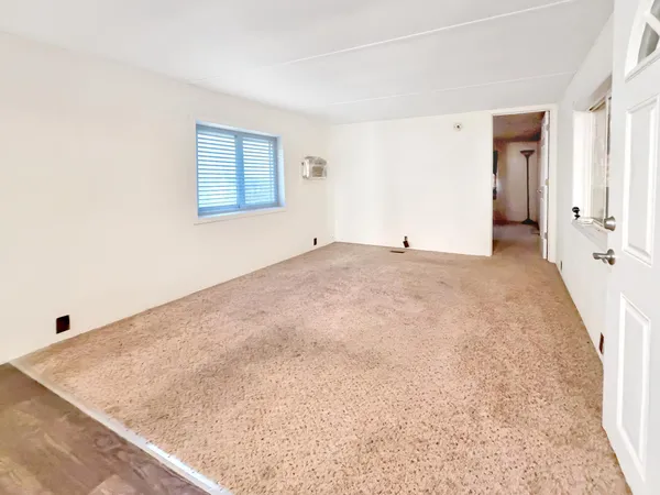 a view of a room with an empty space
