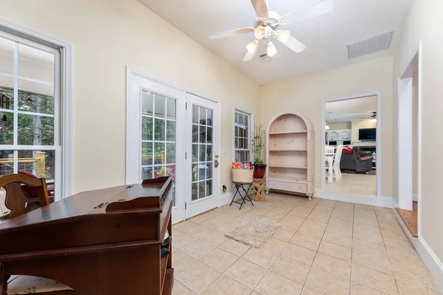a bedroom with a bed and dresser