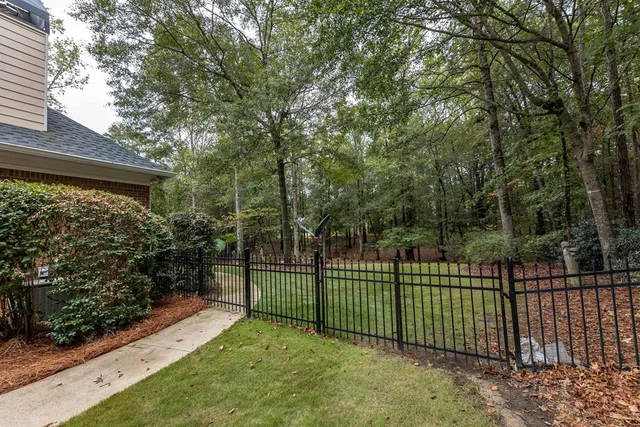 a view of a chairs and table on the wooden floor