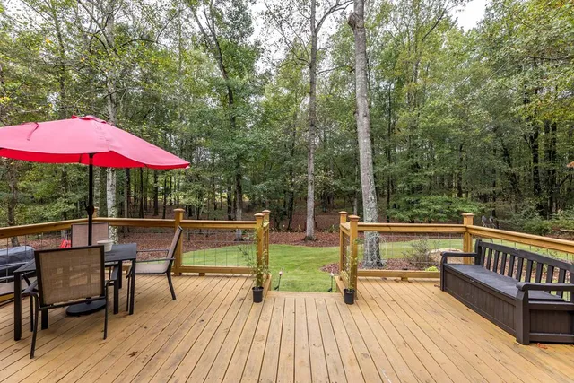 an outdoor space with the garden and swimming pool