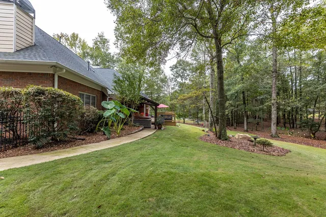 an aerial view of house with yard