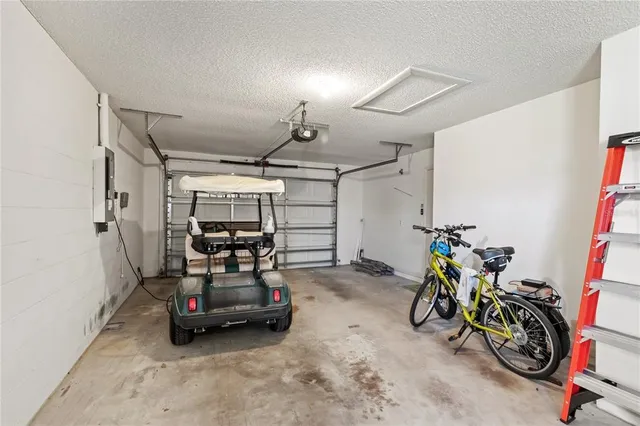 a bedroom with furniture and a gym equipment