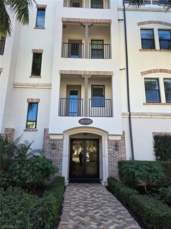 16370 Viansa Way, Unit 6 Naples, FL 34110 - Photo 2 of 27 View of apartment building / complex