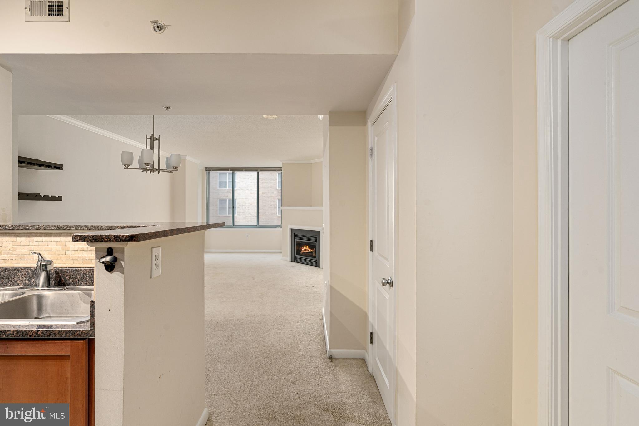 851 North Glebe Road, Unit 1407 Arlington, VA 22203 - Photo 13 of 51 a view of a kitchen with a sink