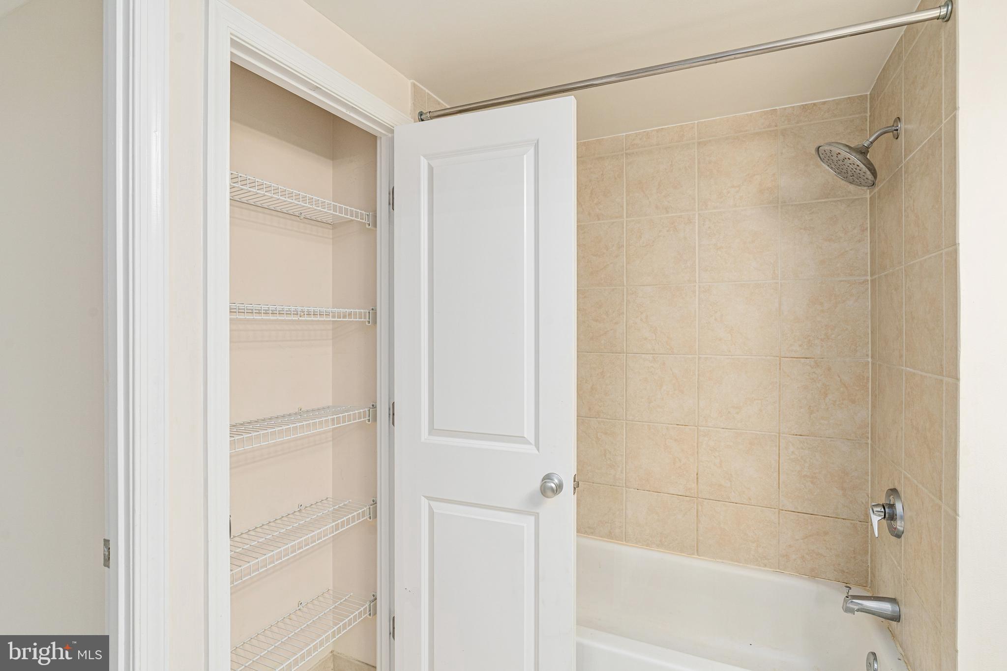851 North Glebe Road, Unit 1407 Arlington, VA 22203 - Photo 20 of 51 a bathroom with a shower