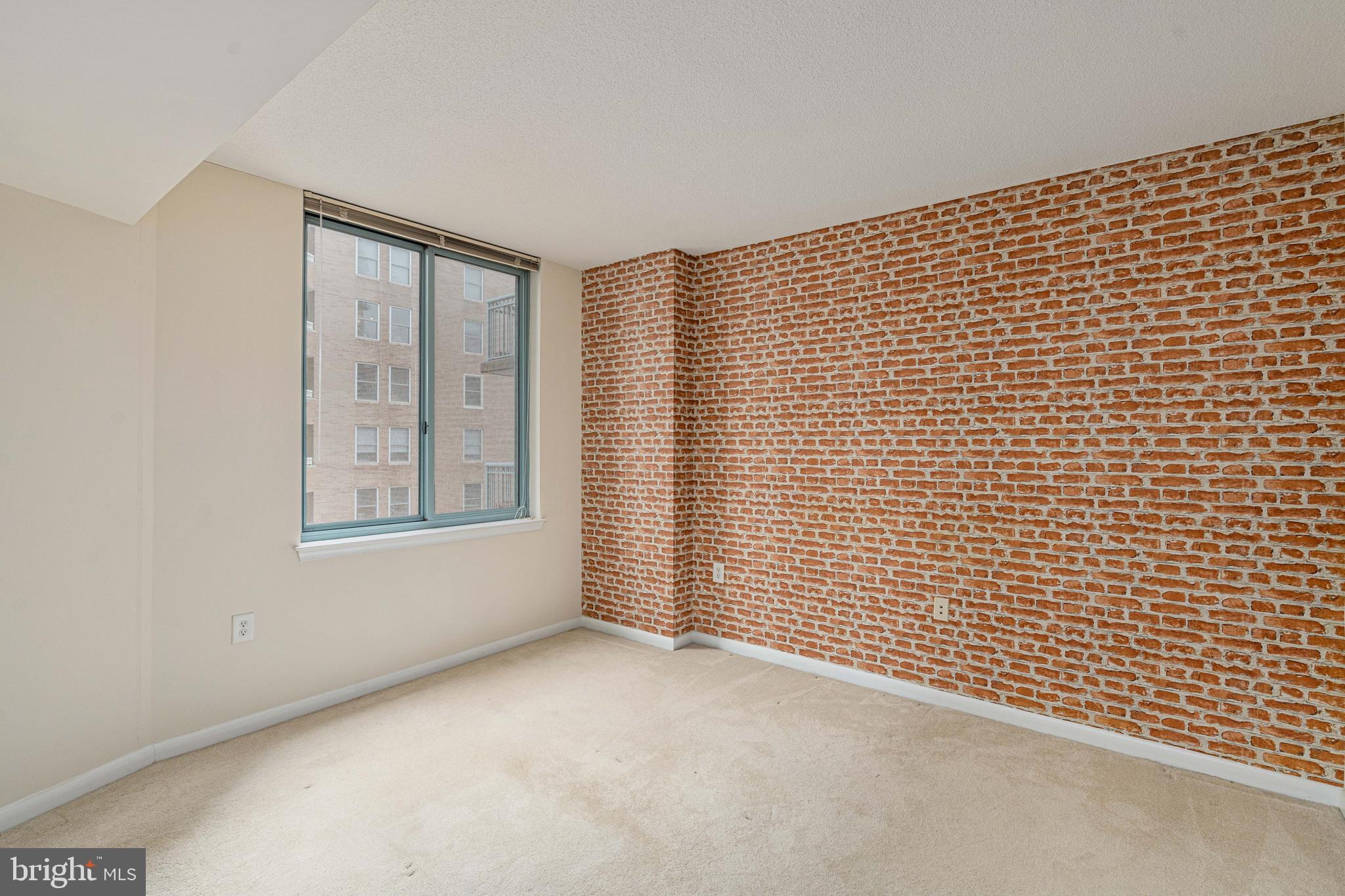 851 North Glebe Road, Unit 1407 Arlington, VA 22203 - Photo 30 of 51 a view of an empty room with a window