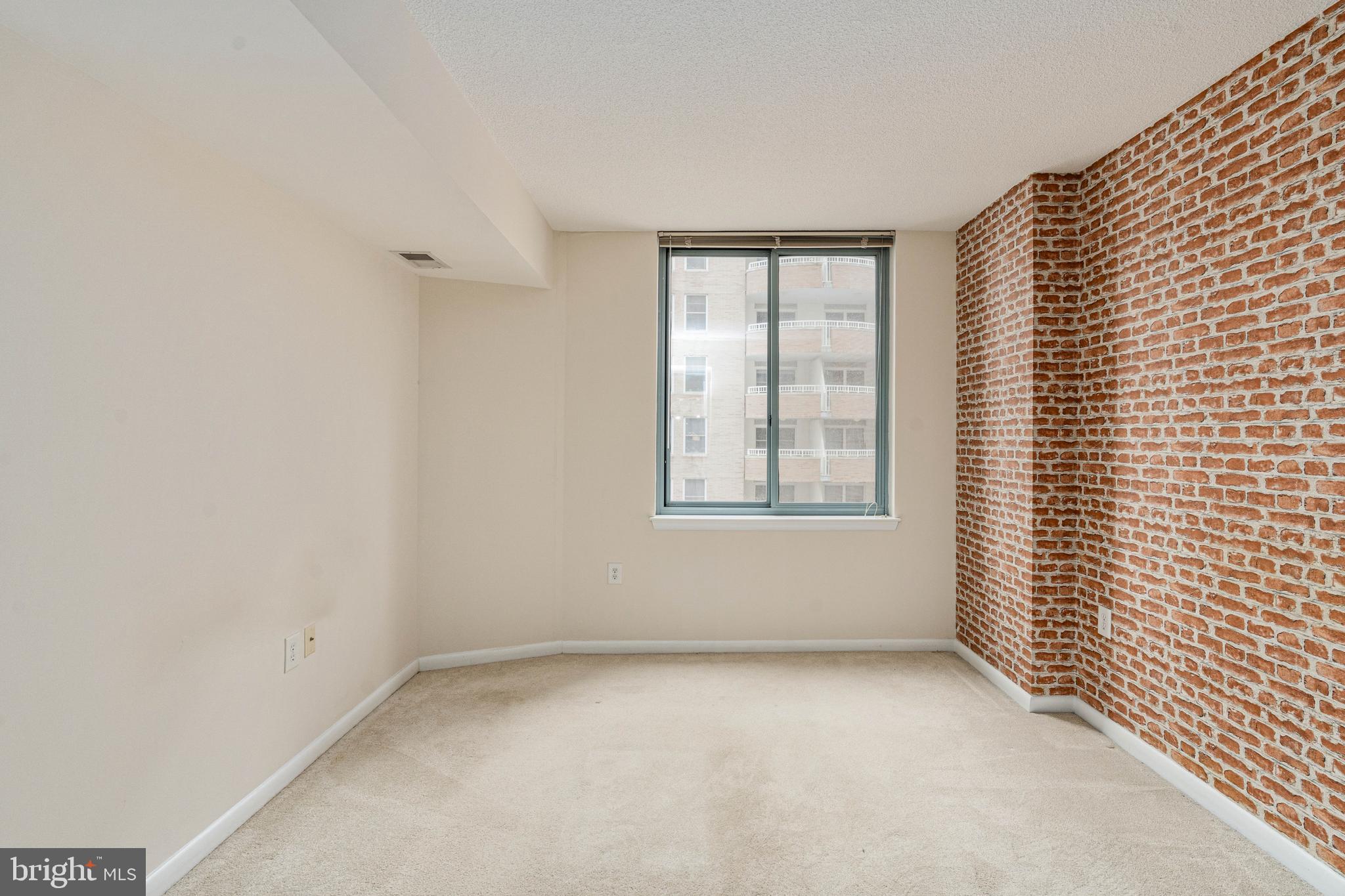 851 North Glebe Road, Unit 1407 Arlington, VA 22203 - Photo 31 of 51 a view of an empty room with a window