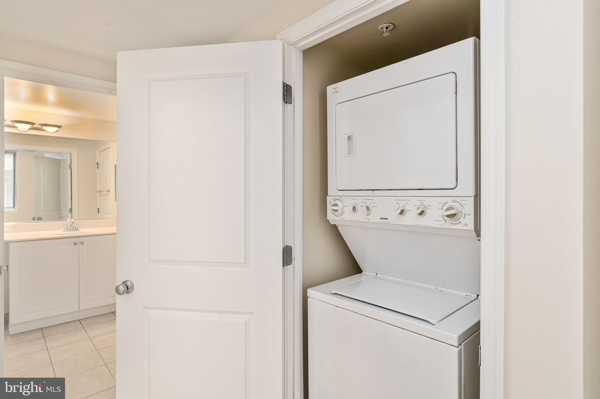 851 North Glebe Road, Unit 1407 Arlington, VA 22203 - Photo 36 of 51 a view of bathroom with washer and dryer