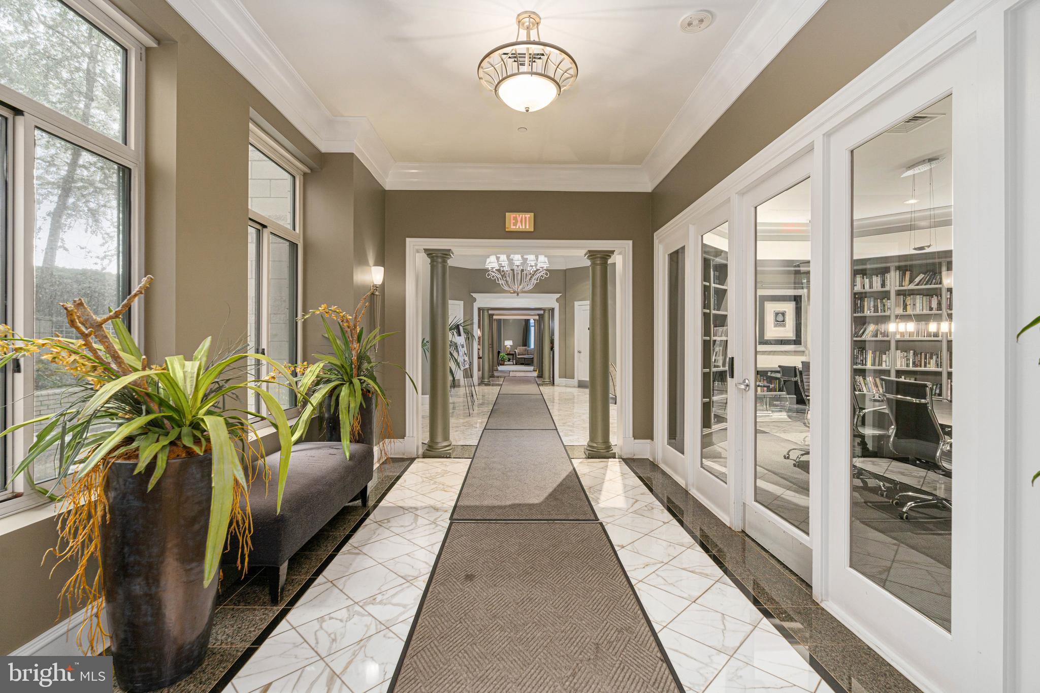 851 North Glebe Road, Unit 1407 Arlington, VA 22203 - Photo 4 of 51 a view of a hallway with windows