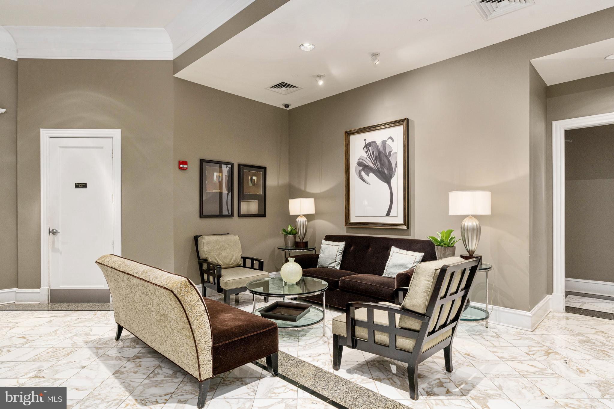 851 North Glebe Road, Unit 1407 Arlington, VA 22203 - Photo 7 of 51 a living room with furniture and a window