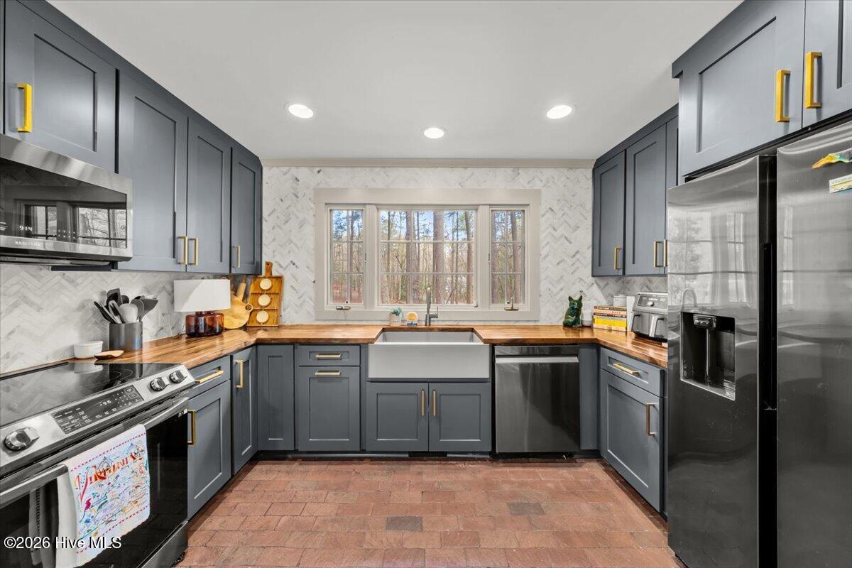 145 Steelman Road Southern Pines, NC 28387 - Photo 22 of 63 Kitchen with original brick flooring