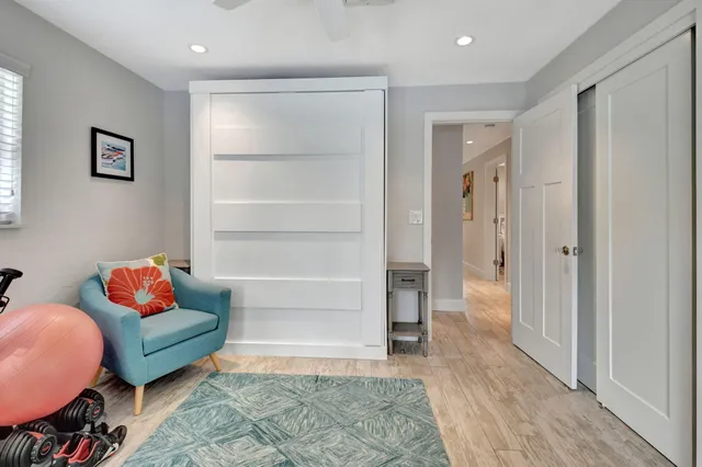 a living room with furniture and a rug