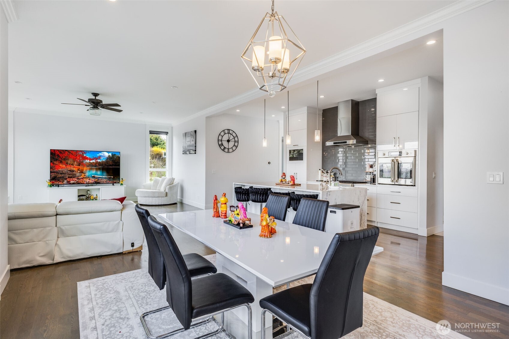 17323 Military Road South SeaTac, WA 98188 - Photo 16 of 40 a view of a dining room with furniture and a chandelier