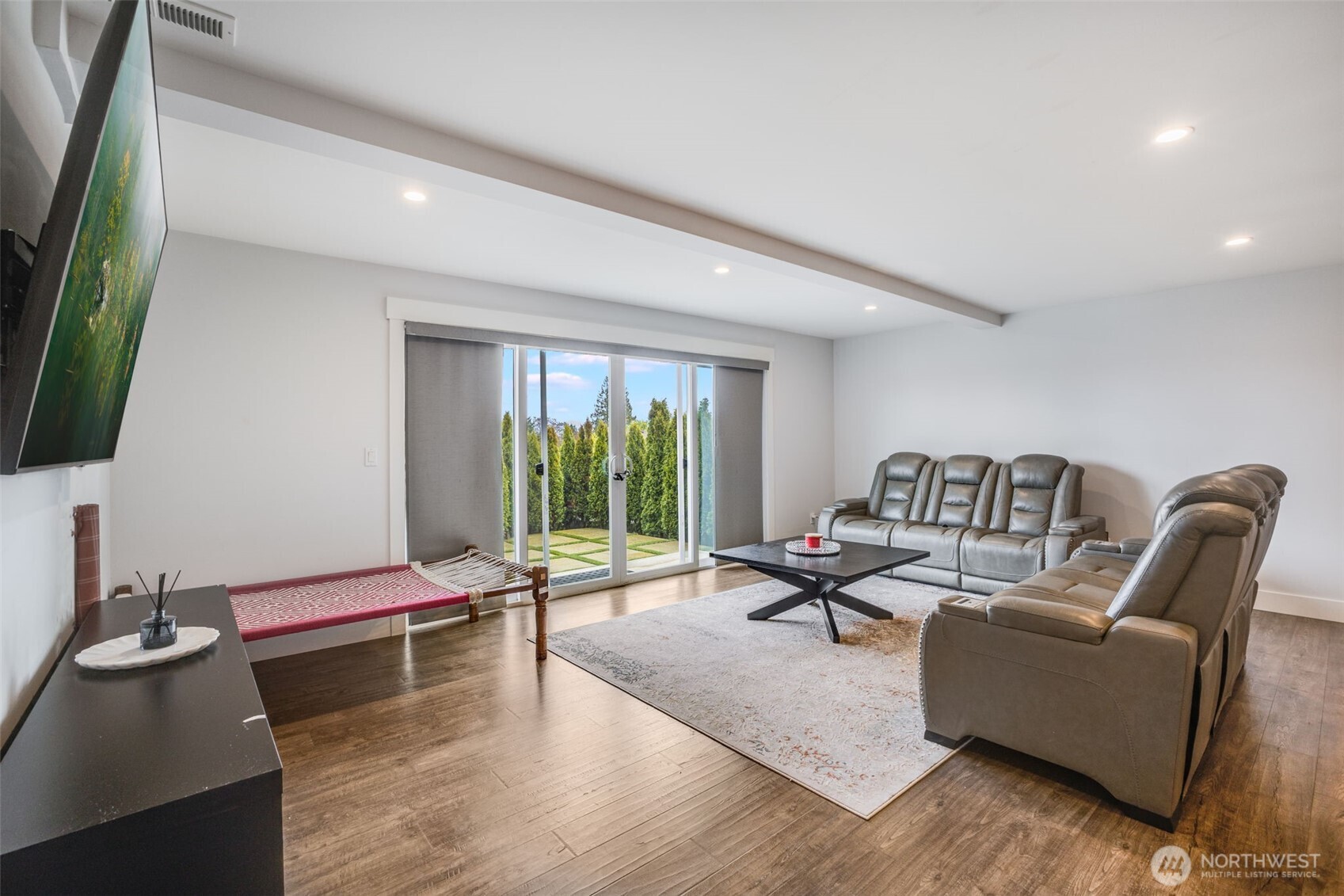 17323 Military Road South SeaTac, WA 98188 - Photo 19 of 40 a living room with furniture rug and a large window