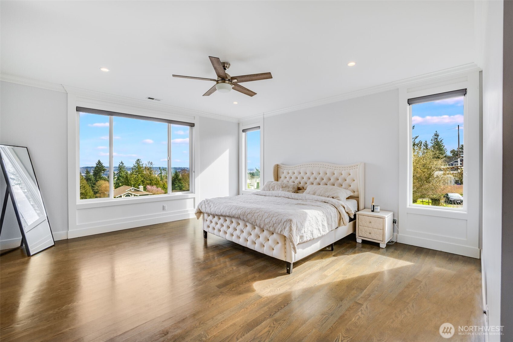 17323 Military Road South SeaTac, WA 98188 - Photo 20 of 40 a spacious bedroom with a bed and a large window