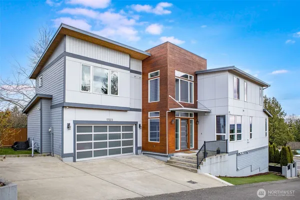 a front view of a house with a garage