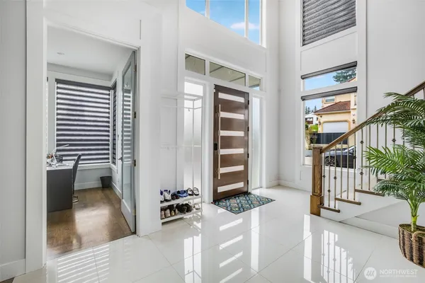 a view of livingroom with furniture and floor to ceiling window