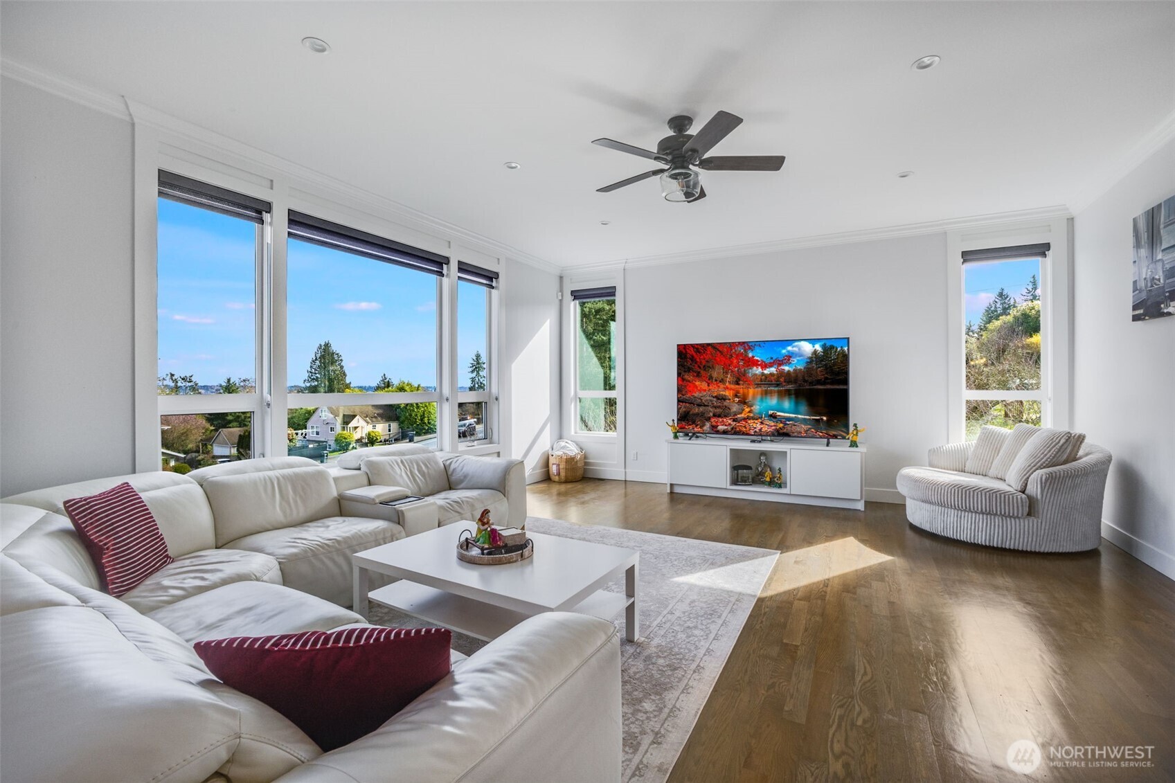 17323 Military Road South SeaTac, WA 98188 - Photo 9 of 40 a living room with furniture and a flat screen tv
