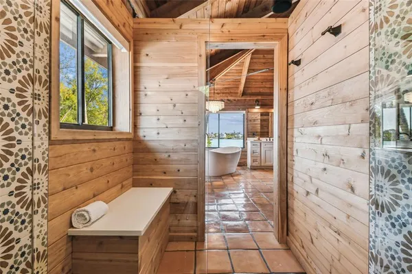 a bathroom with a sink vanity and a mirror