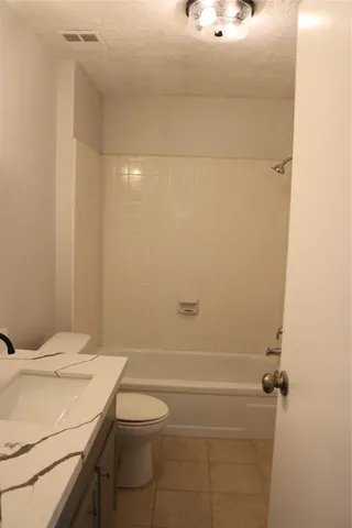 a bathroom with a sink and toilet