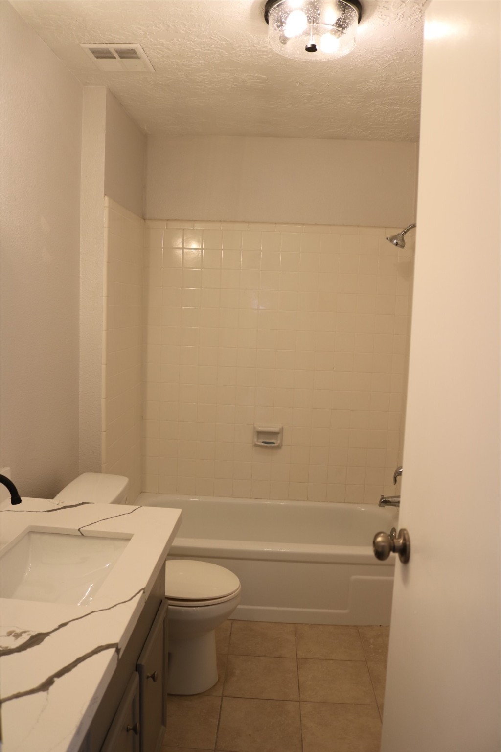4018 Easy Street Dickinson, TX 77539 - Photo 11 of 11 a bathroom with a sink and toilet