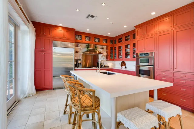 a dining table with chairs and a table