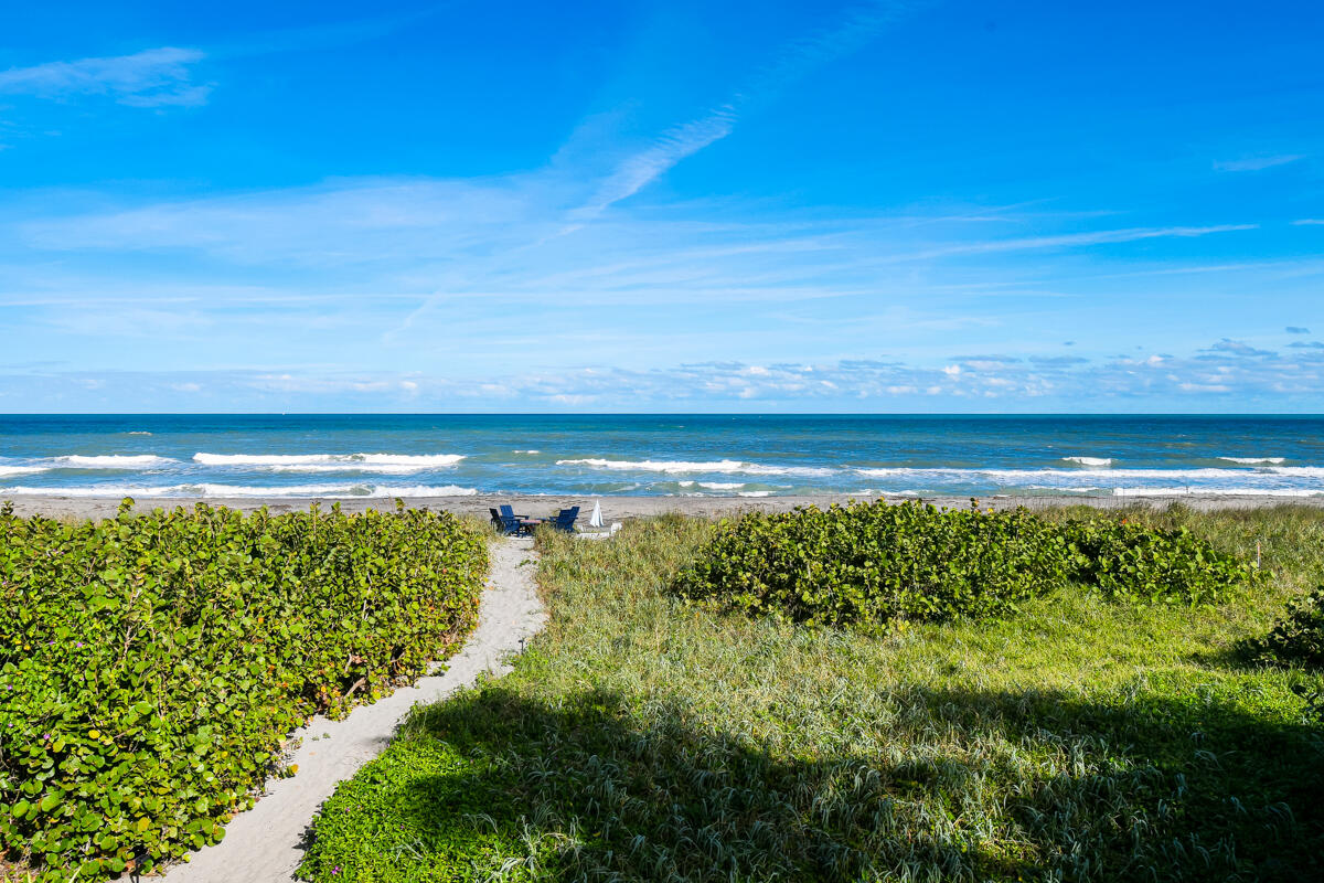107 North Beach Road Jupiter Island, FL 33455 - Photo 49 of 49 a view of an ocean from a yard