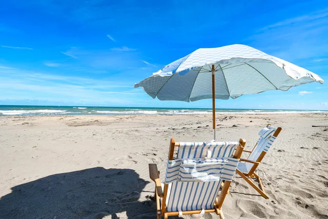 a view of an outdoor space with an ocean beach