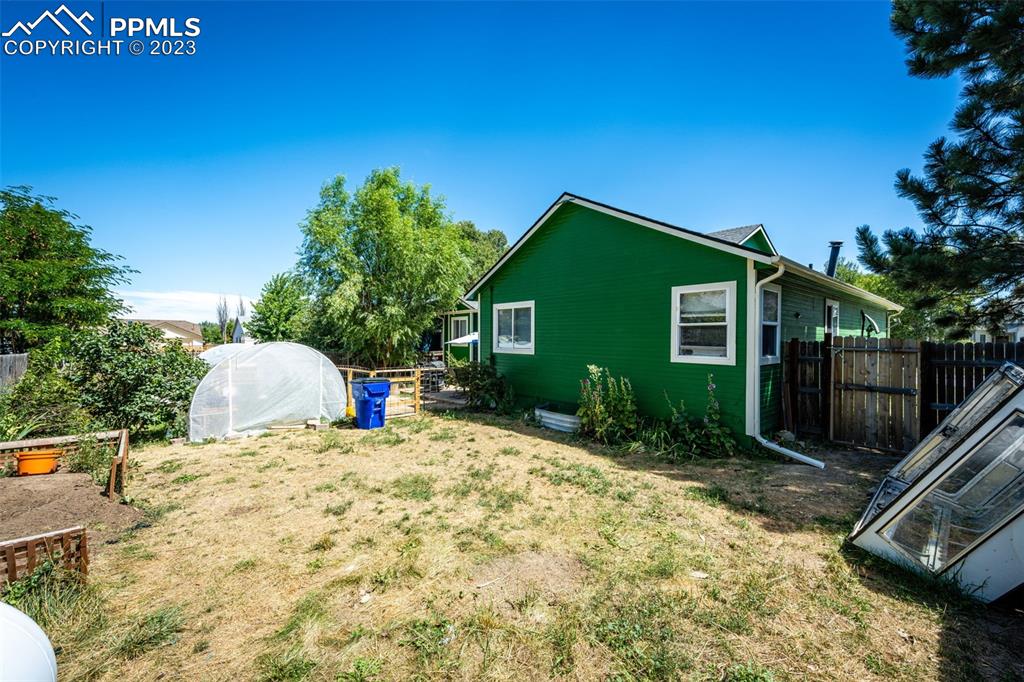 1023 Monument Street Calhan, CO 80808 - Photo 32 of 35 a view of a backyard with sitting area