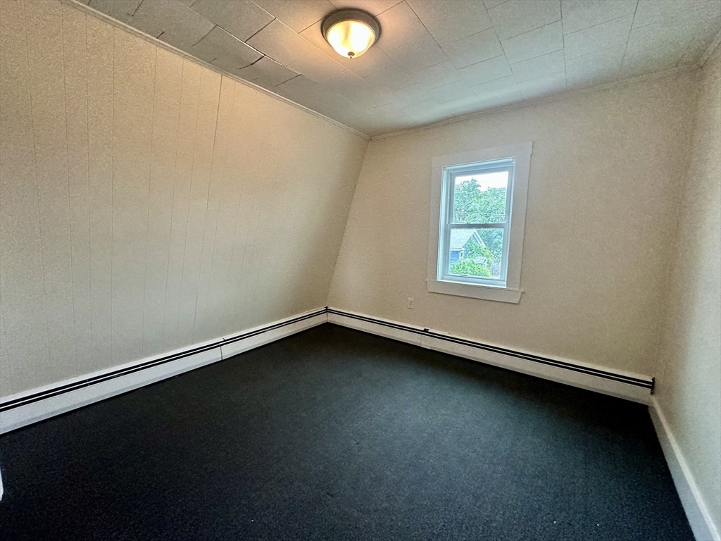 354 University Avenue Lowell, MA 01854 - Photo 7 of 13 an empty room with a window