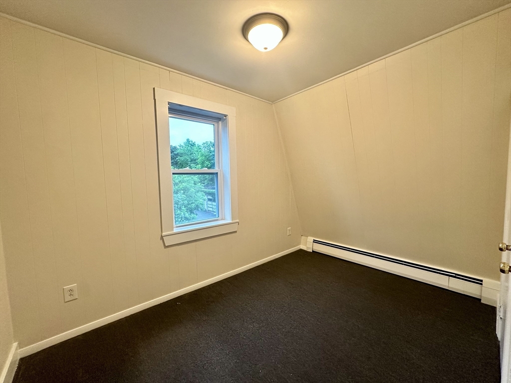 354 University Avenue Lowell, MA 01854 - Photo 9 of 13 an empty room with a window