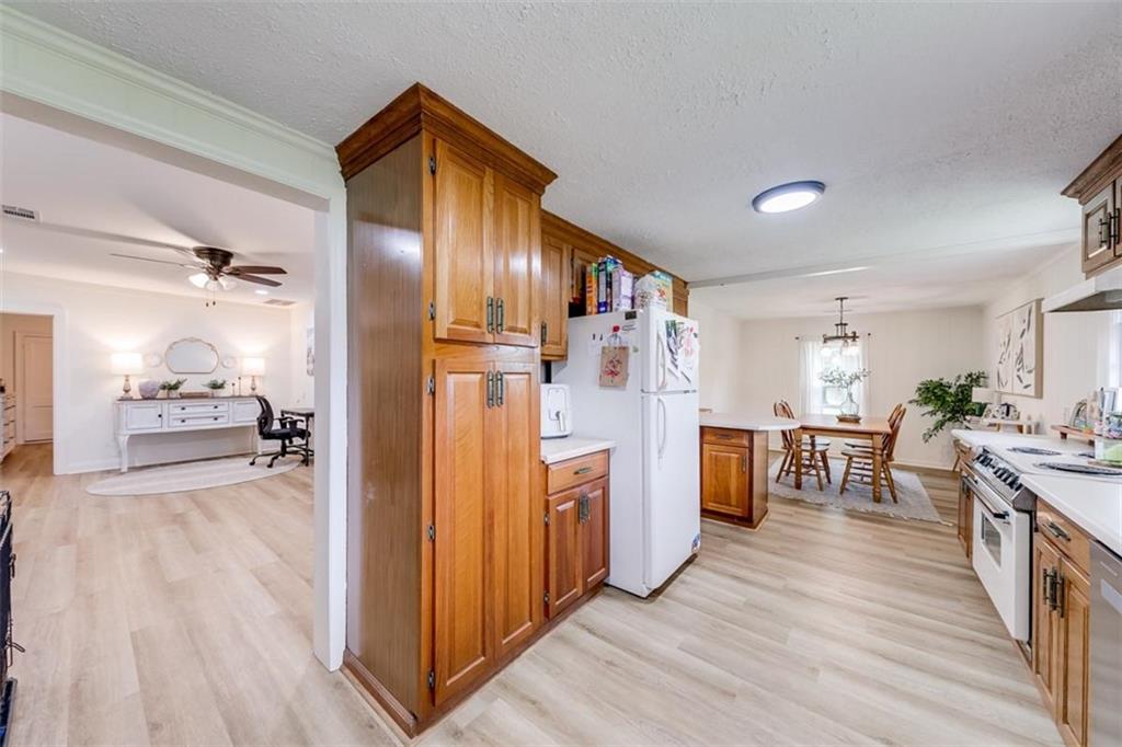 2630 Prospect Road Toccoa, GA 30577 - Photo 13 of 40 a view of a kitchen center island and wooden floor