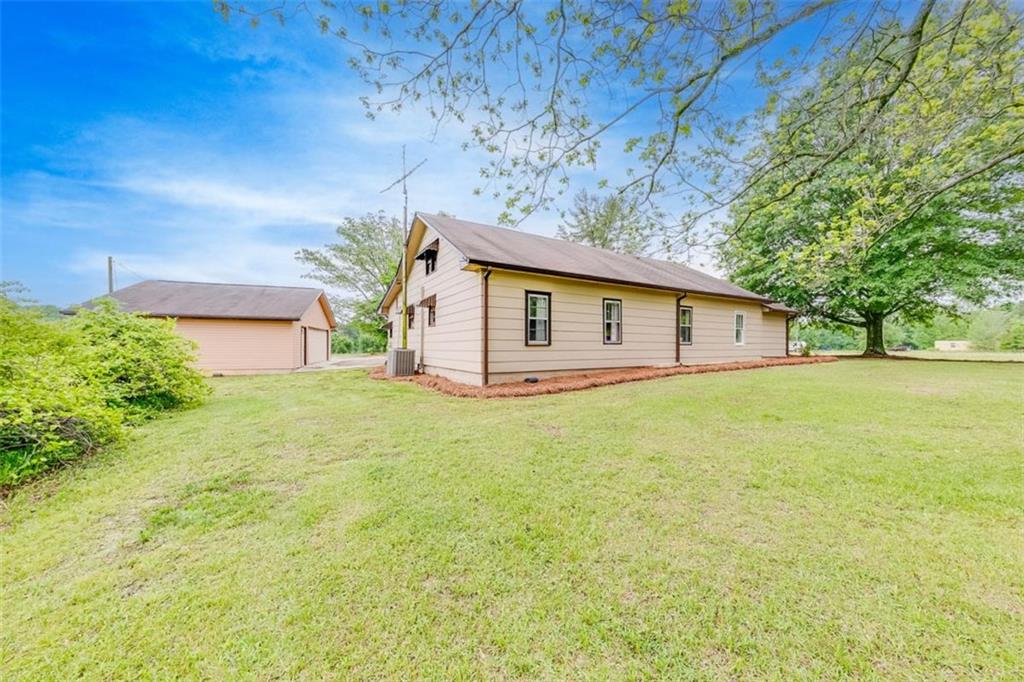 2630 Prospect Road Toccoa, GA 30577 - Photo 2 of 40 a house view with a garden space