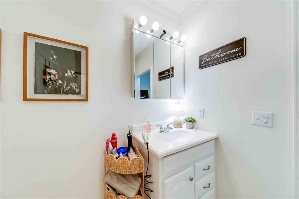 2630 Prospect Road Toccoa, GA 30577 - Photo 23 of 40 a bathroom with a sink and a mirror