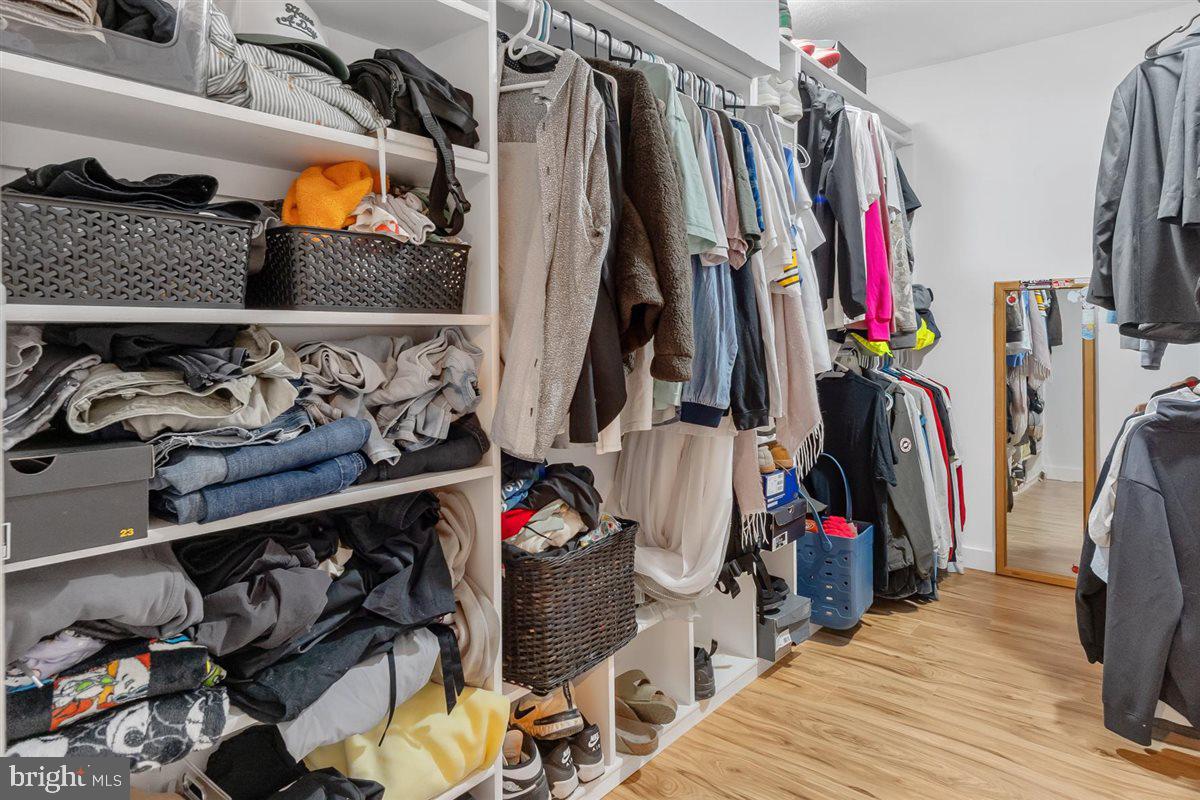 2390 Shirley Road Charles Town, WV 25414 - Photo 54 of 69 a view of walk in closet with clothes and shoes