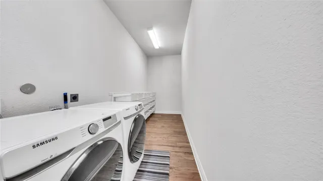 a utility room with dryer and washer